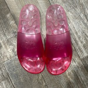 Pink jelly coat slides never been worn in great condition.